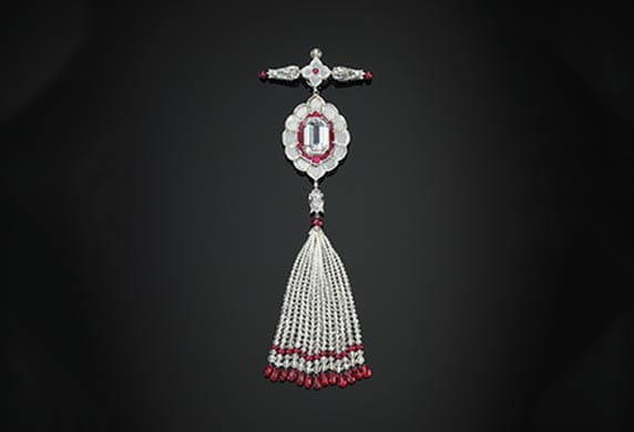 Pendant brooch set with diamonds and rubies. Copyright Servette Overseas Ltd 2014