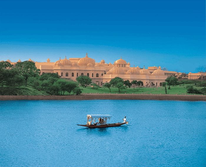 Shikara boat for guest transfers at The Oberoi Udaivilas, Udaipur